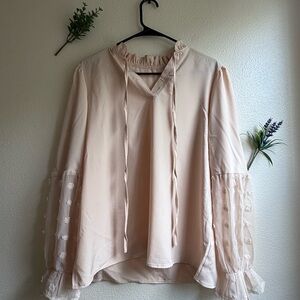 Elegant Cream Blouse with Sheer Sleeves